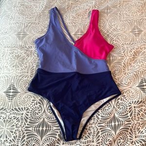 NWOT color block tank one piece suit size large